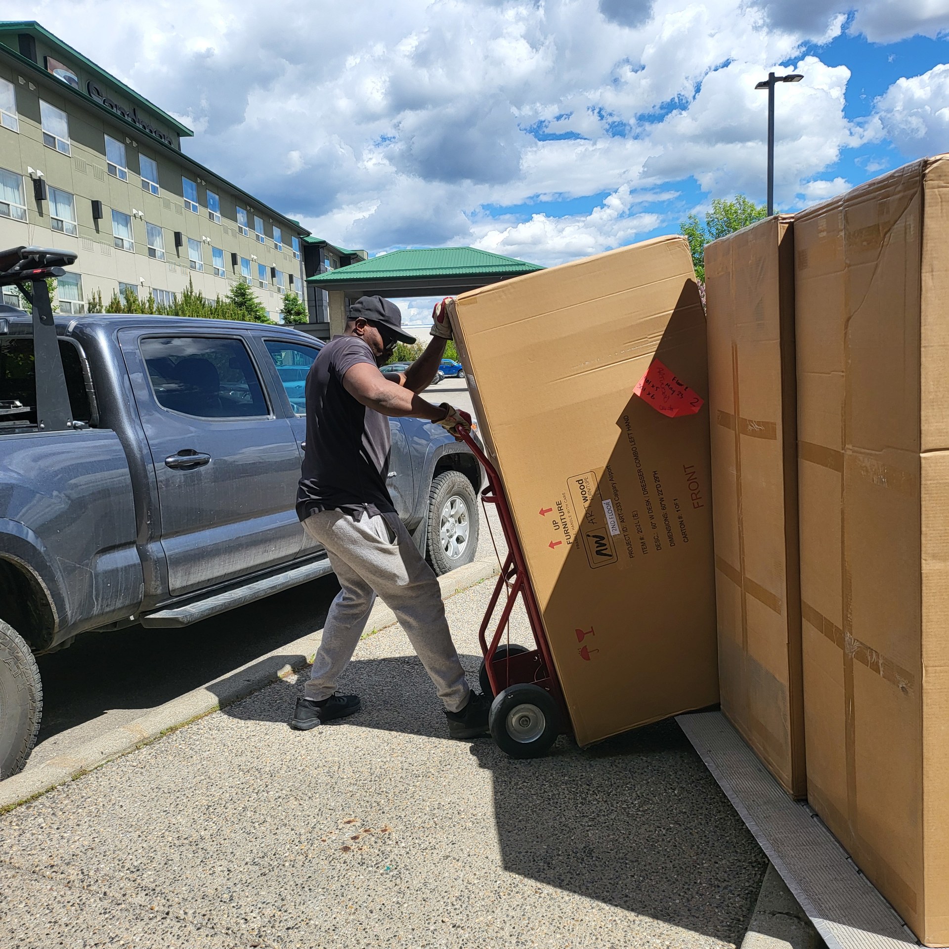 Cargo Van Logistics crew loading furniture